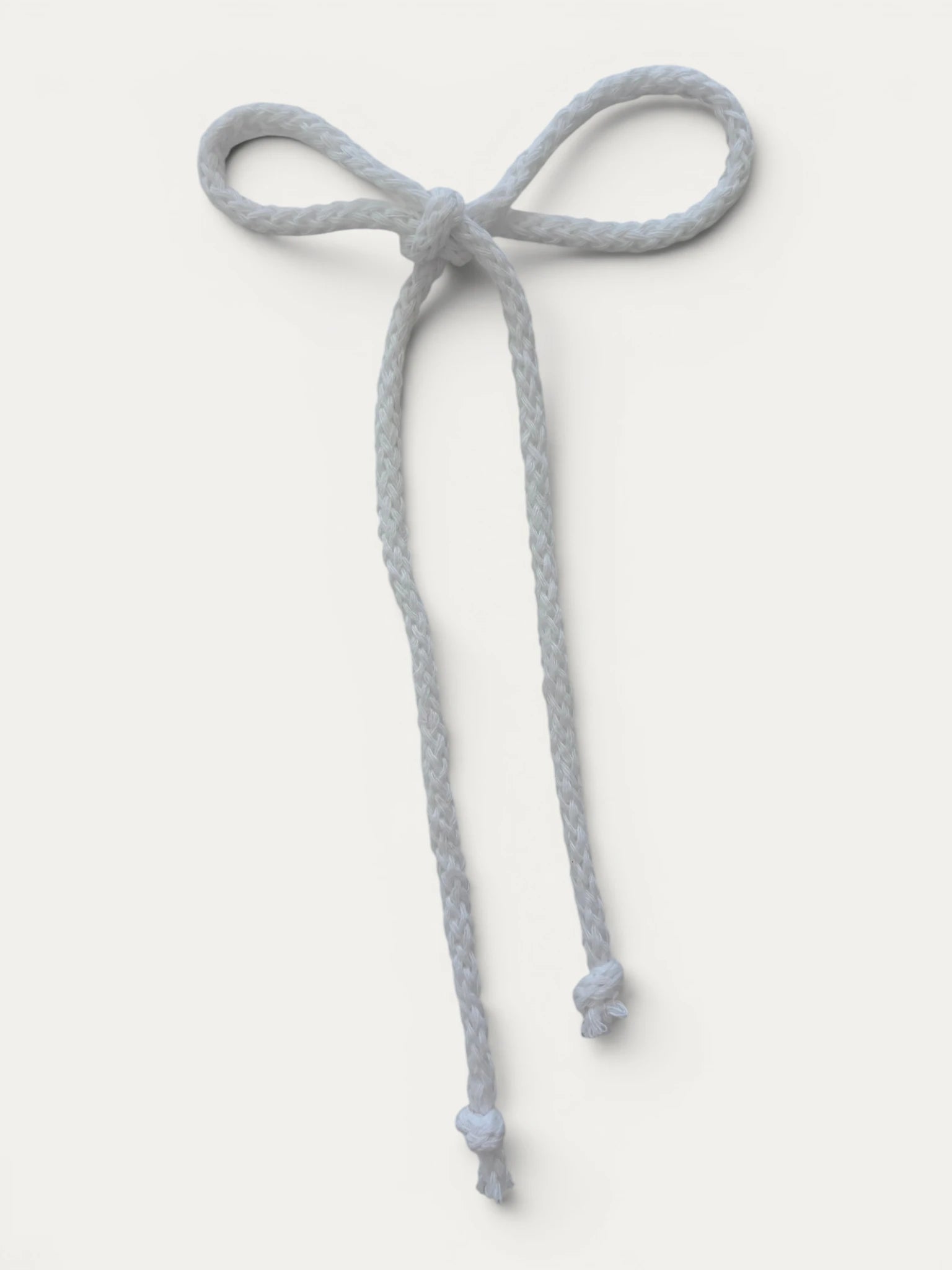 Long braided cotton hair cord for girls in White; soft texture and elegant braided design, made in Spain and shipped from Switzerland.