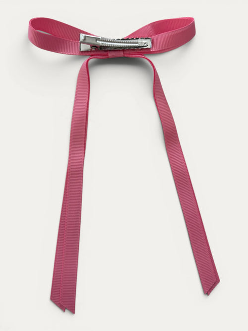 Classic long grosgrain Fuchsia bow clip for girls in Light Fuchsia; soft bright tone, elegant silhouette, made in Spain and shipped from Switzerland.