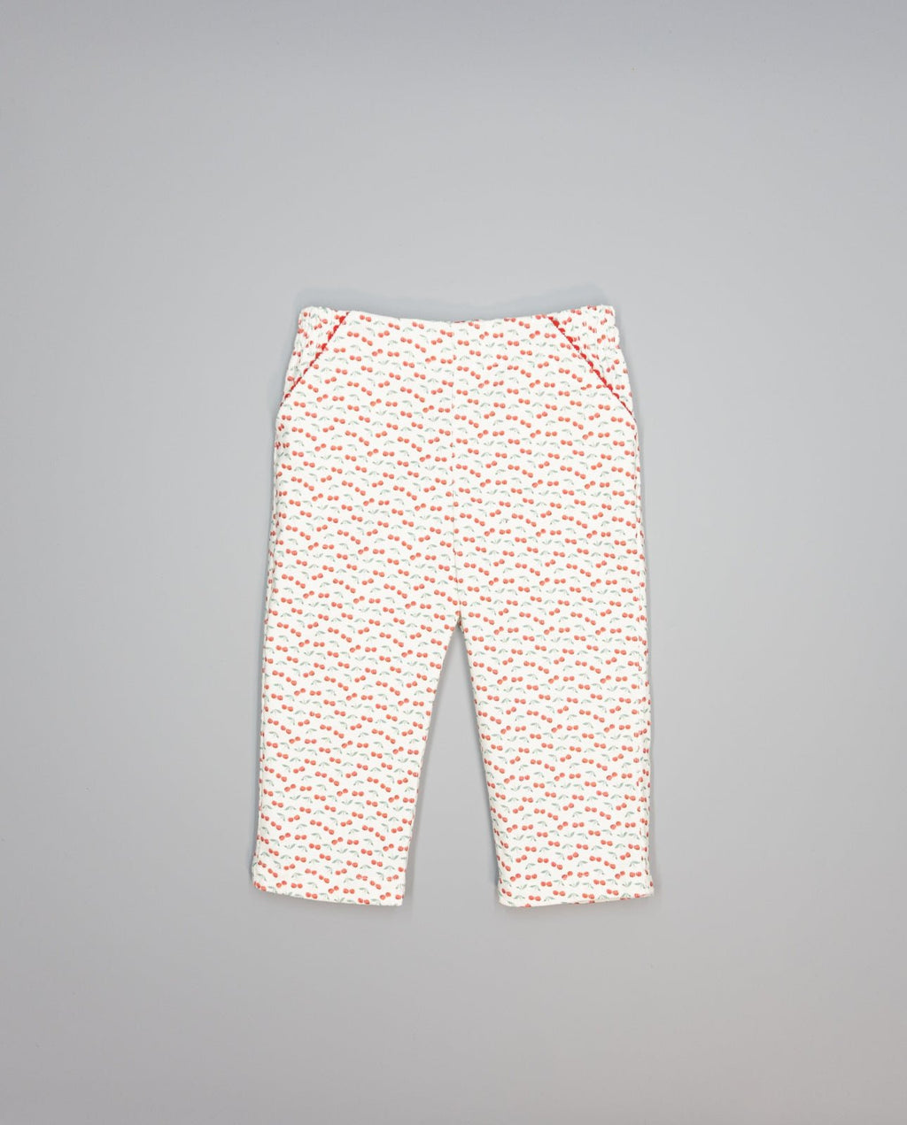 Corduroy trousers with cherry print and picot-trim pockets