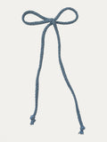 Long braided cotton hair cord for girls in Light Blue; pastel tone, elegant braided design, made in Spain and shipped from Switzerland.