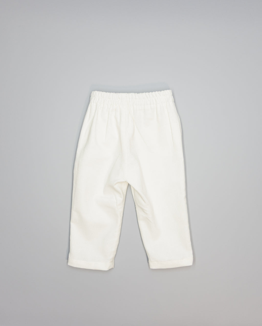 Girls corduroy trousers with ruffle detail on side pockets