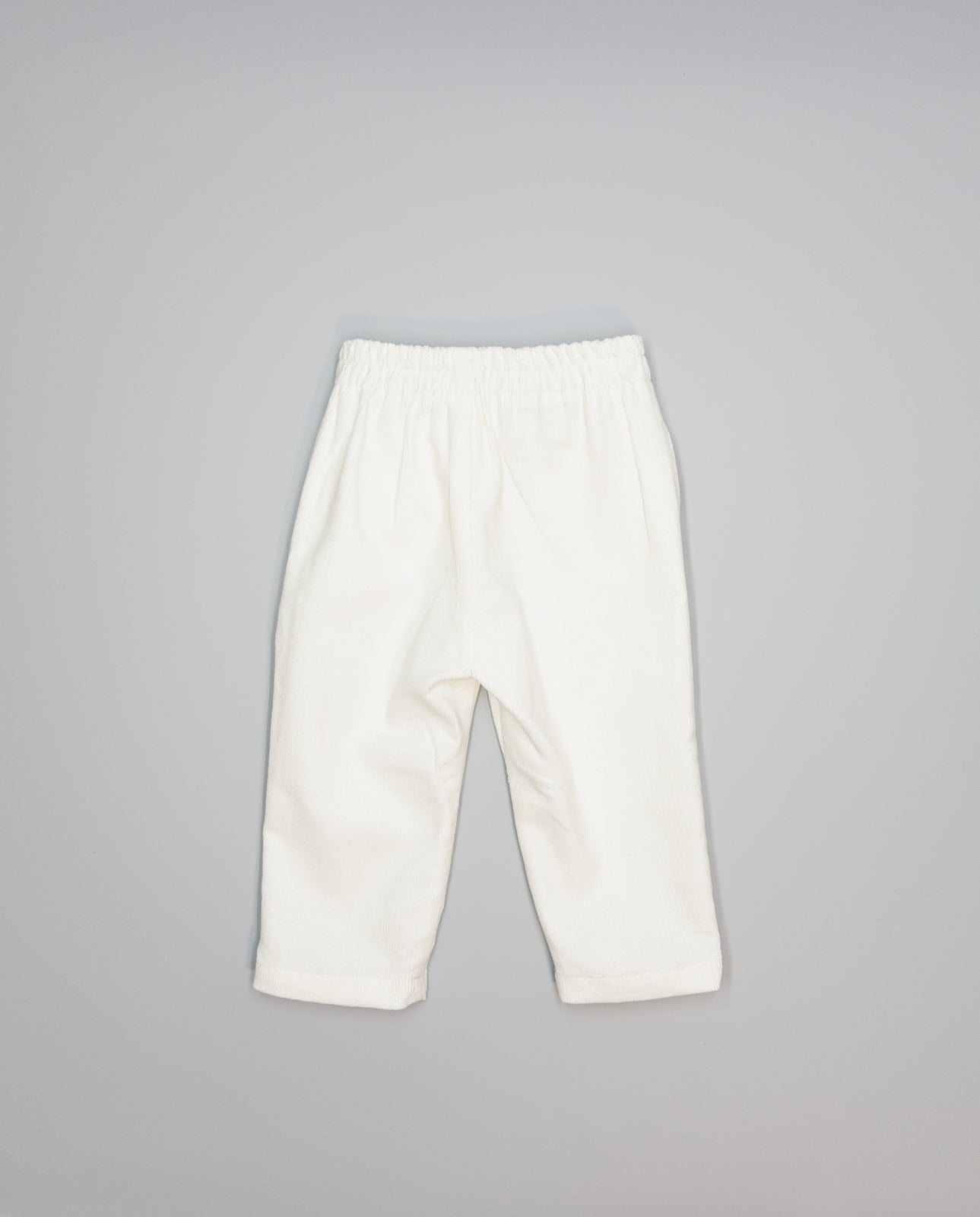 Girls corduroy trousers with ruffle detail on side pockets