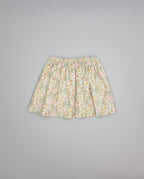 Beige floral viella gathered skirt with pockets trimmed in beige piping