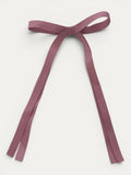 Classic long grosgrain bow clip for girls in French Rose; soft tone, elegant silhouette, made in Spain and shipped from Switzerland.
