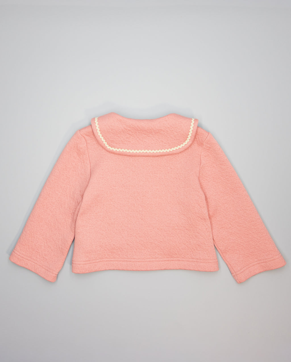 Girl pink fleece jacket with sailor collar and ric-rac trim