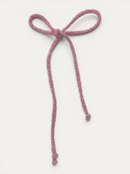 Long braided cotton hair cord for girls in Light Pink; soft pastel tone, elegant braided design, made in Spain and shipped from Switzerland.
