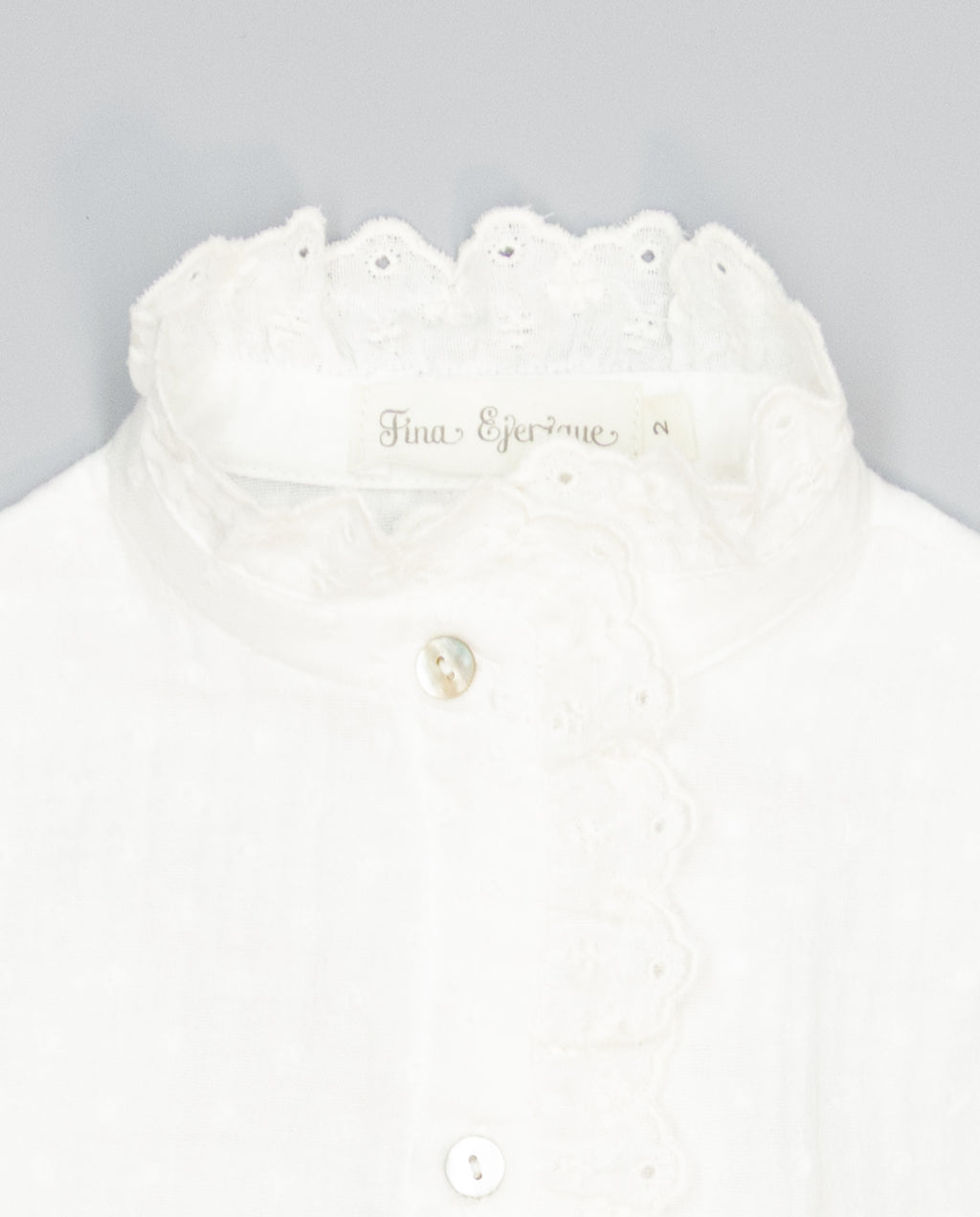 Beige girls cotton shirt with plumeti and embroidered ruffle