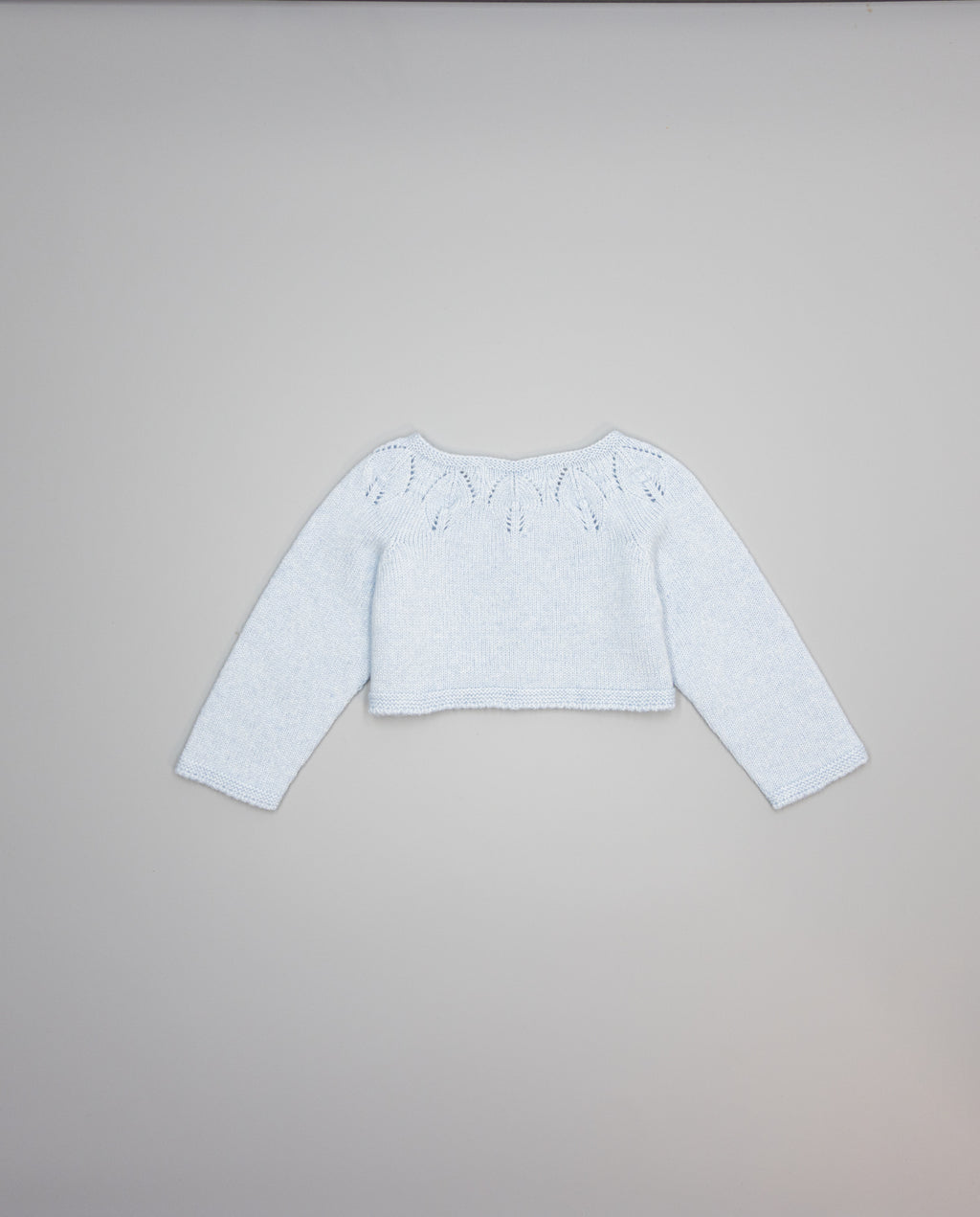 blue girls cashmere cardigan with eyelets and pearl buttons