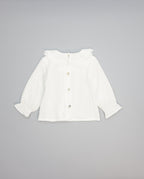 White structured cotton blouse with ruffled front and lace inserts