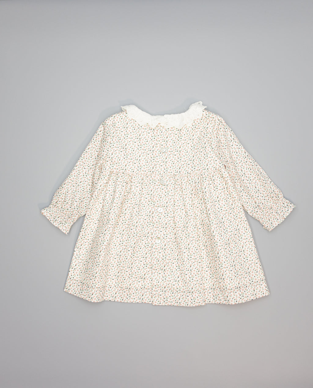 Baby pink floral viella dress with embroidered ruffled collar and long sleeves. 