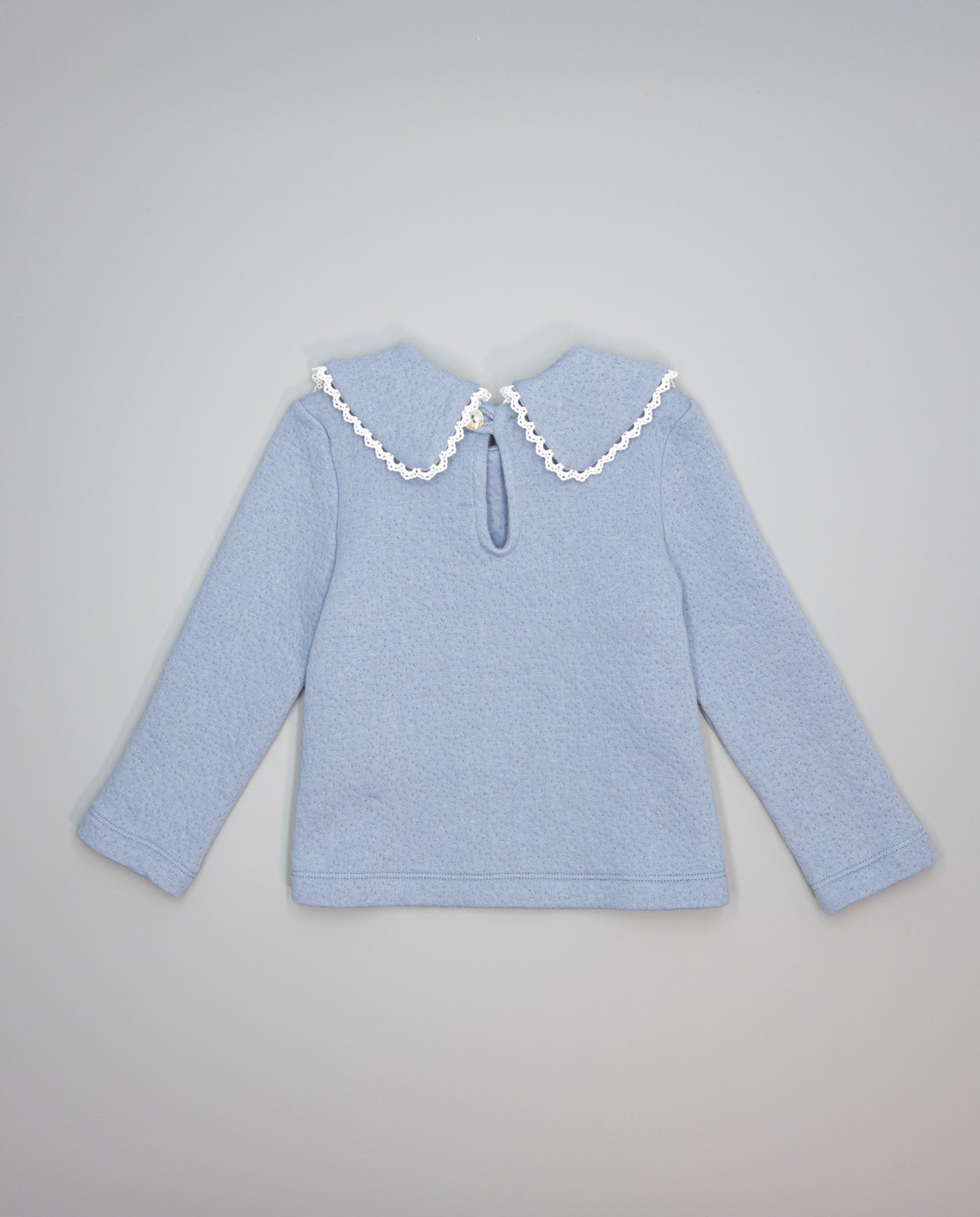 Blue textured knit sweater with guipure collar