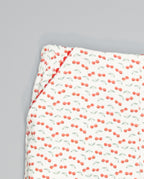 Corduroy trousers with cherry print and picot-trim pockets