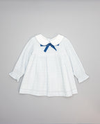 Baby girls blue gingham dress with white collar and contrast velvet bow
