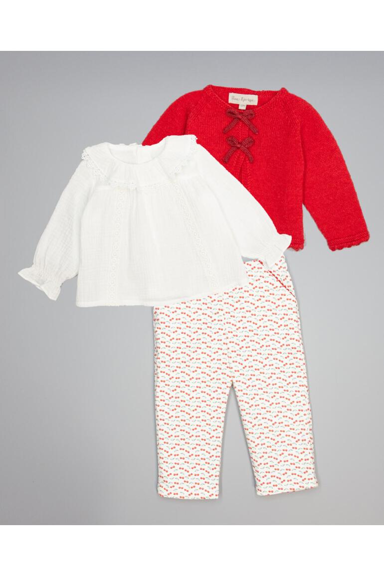 White structured cotton blouse with ruffled front and lace inserts
