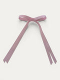Classic long grosgrain bow clip for girls in Light Pink; pastel tone, elegant silhouette, made in Spain and shipped from Switzerland.