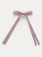 Classic long grosgrain bow clip for girls in Light Pink; pastel tone, elegant silhouette, made in Spain and shipped from Switzerland.