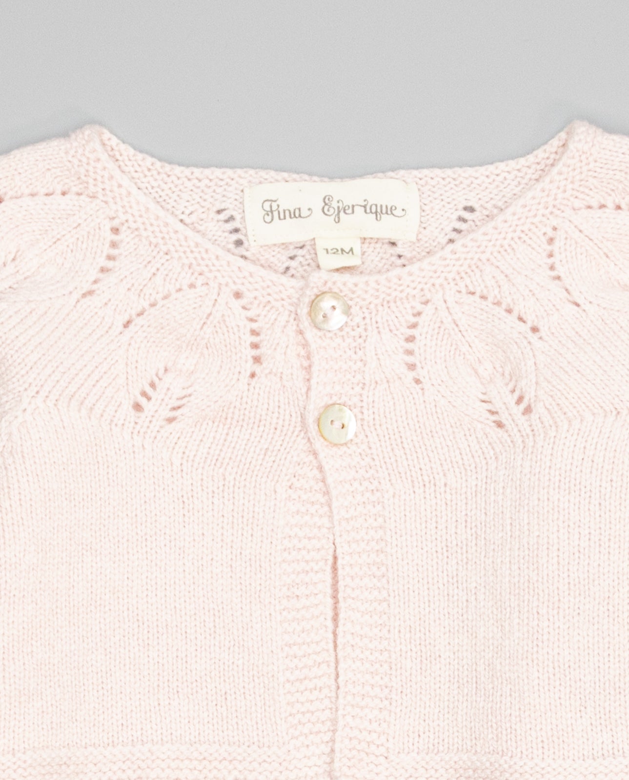 Pink girls cashmere cardigan with eyelets and pearl buttons