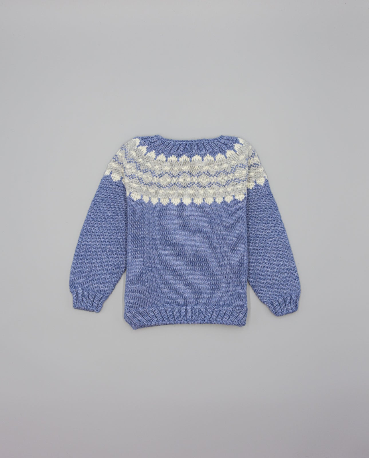 Boy’s merino wool jumper with contrasting jacquard pattern