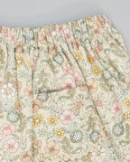 Beige floral viella gathered skirt with pockets trimmed in beige piping