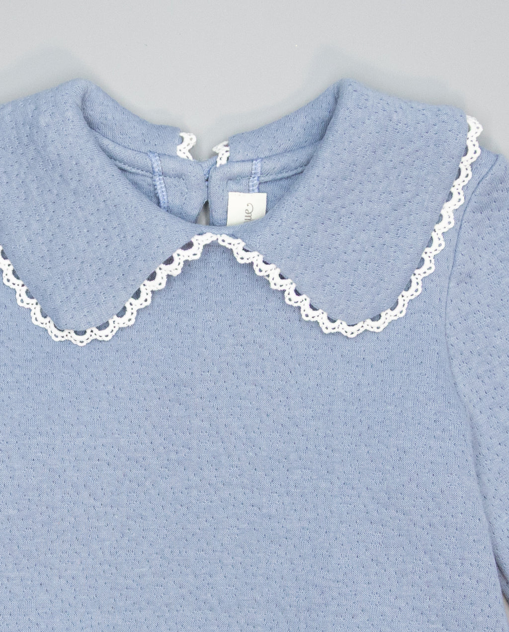 Blue textured knit sweater with guipure collar