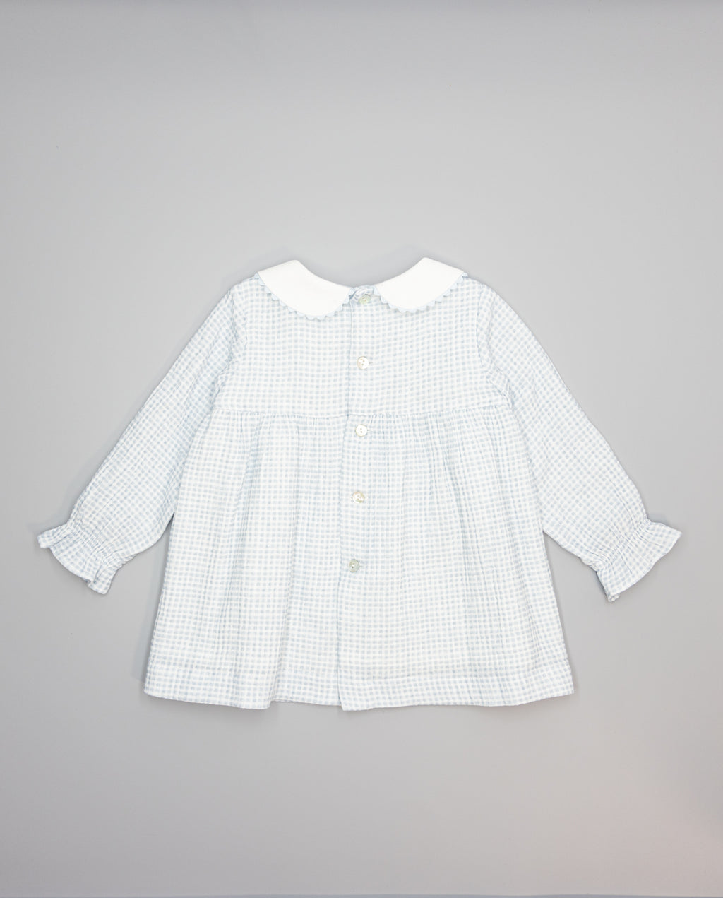 Baby girls blue gingham dress with white collar and contrast velvet bow
