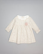 Baby pink floral viella dress with embroidered ruffled collar and long sleeves. 