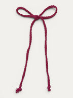 Long braided cotton hair cord for girls in Fuchsia; vibrant color, elegant braided design, made in Spain and shipped from Switzerland.