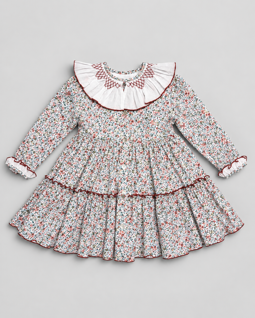 Robe smockée Sofia en terracotta à imprimé floral