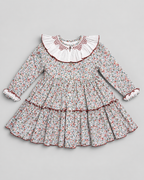 Robe smockée Sofia en terracotta à imprimé floral