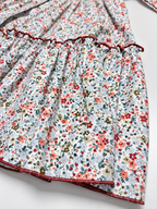 Robe smockée Sofia en terracotta à imprimé floral